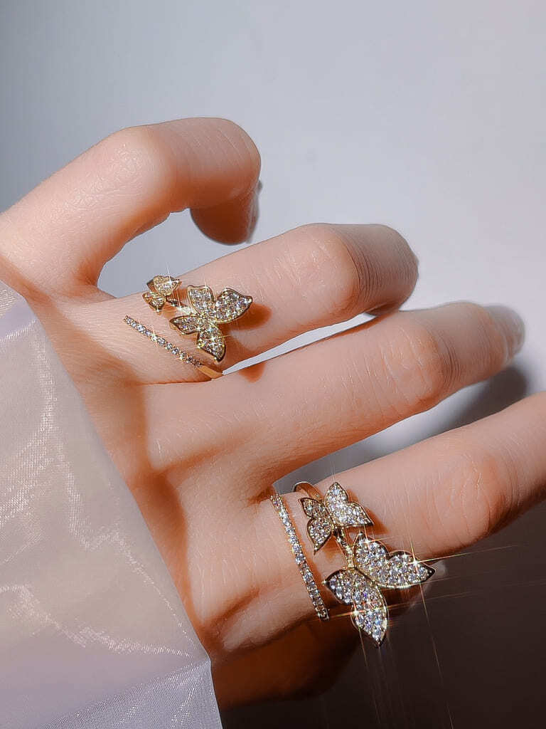2 Crystal Butterfly line ring (s)