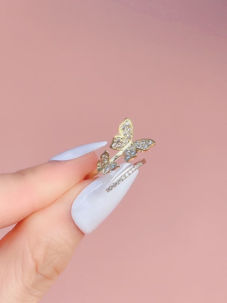 2 Crystal Butterfly line ring (s)