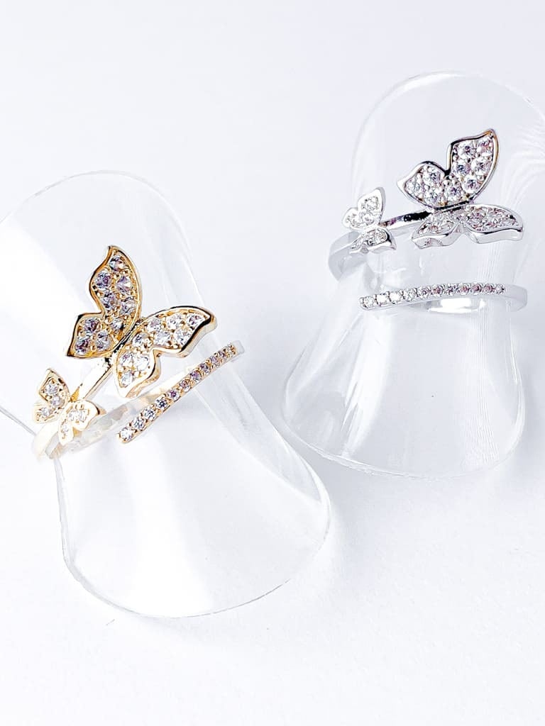 2 Crystal Butterfly line ring (s)