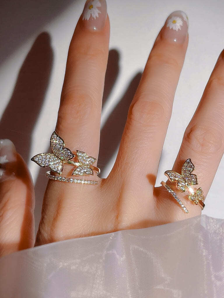 2 Crystal Butterfly line ring (s)