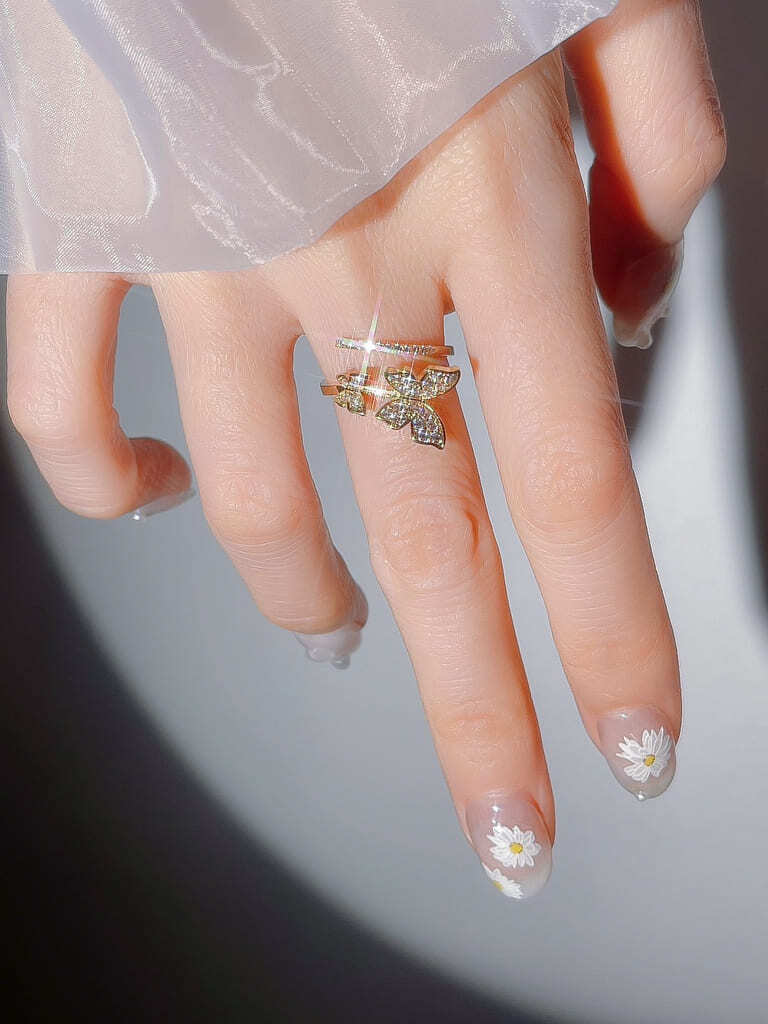 2 Crystal Butterfly line ring (s)