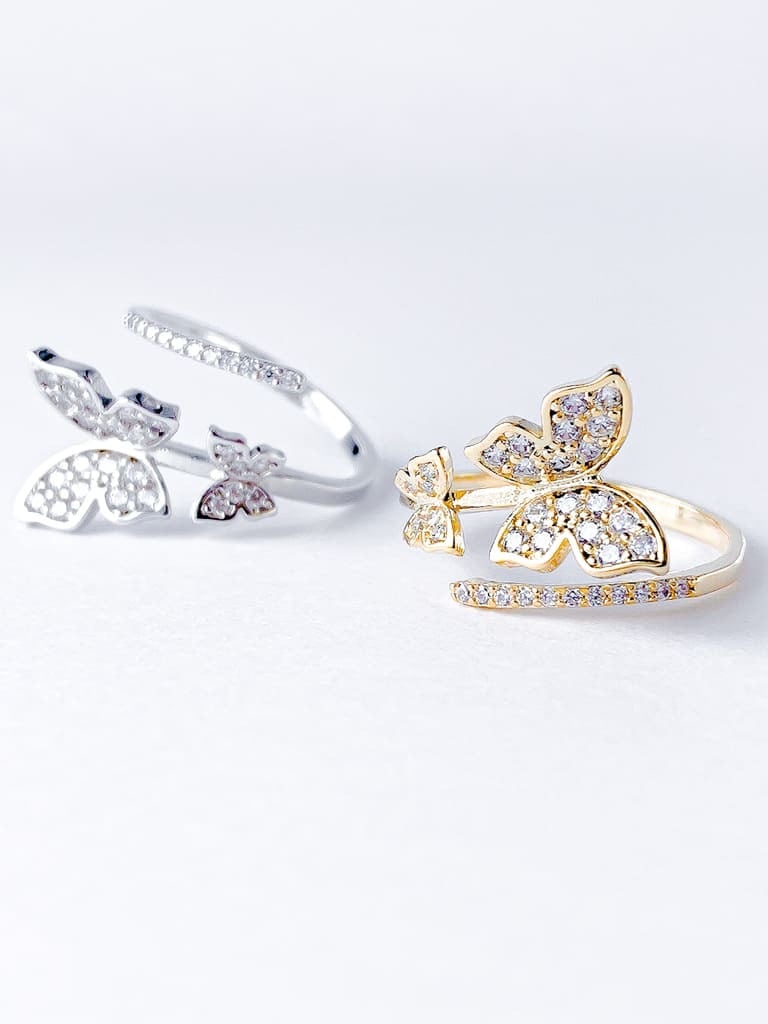 2 Crystal Butterfly line ring (s)