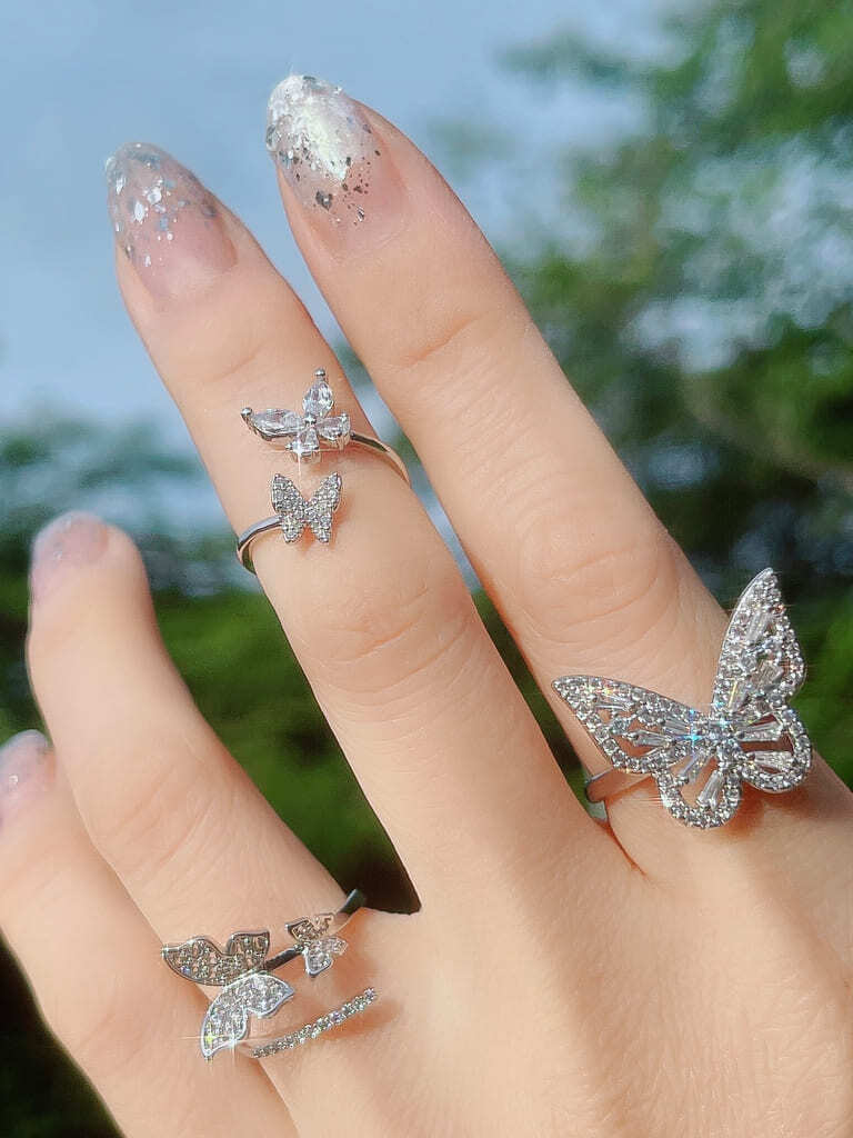 2 Crystal Butterfly line ring (s)