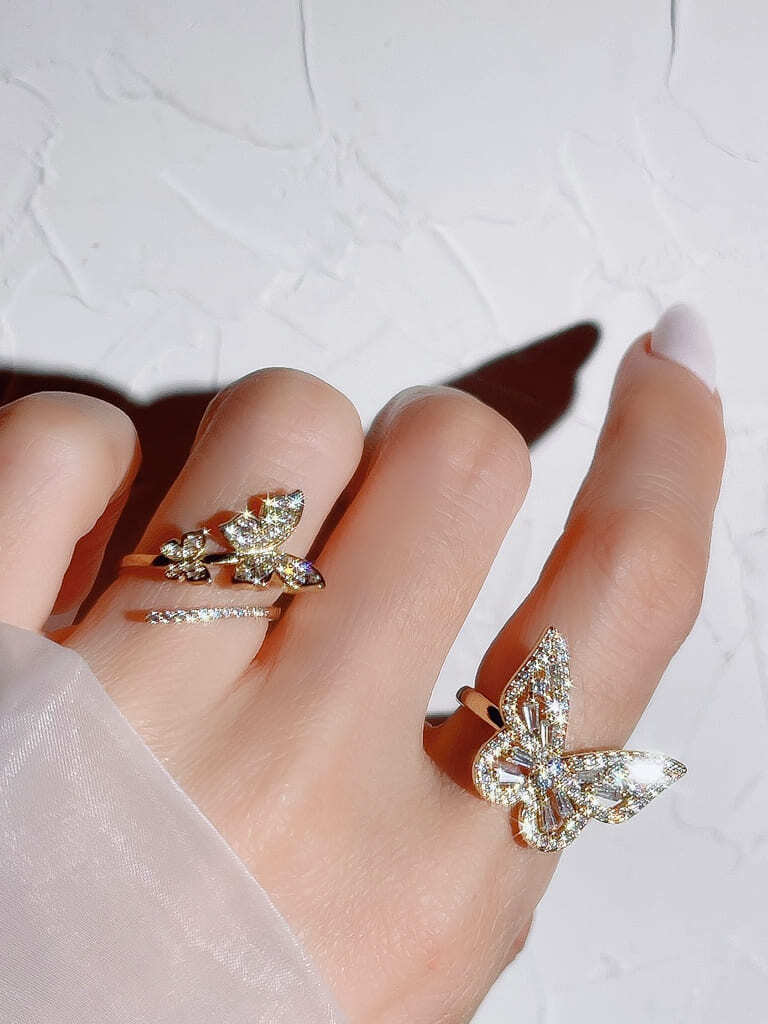 2 Crystal Butterfly line ring (s)